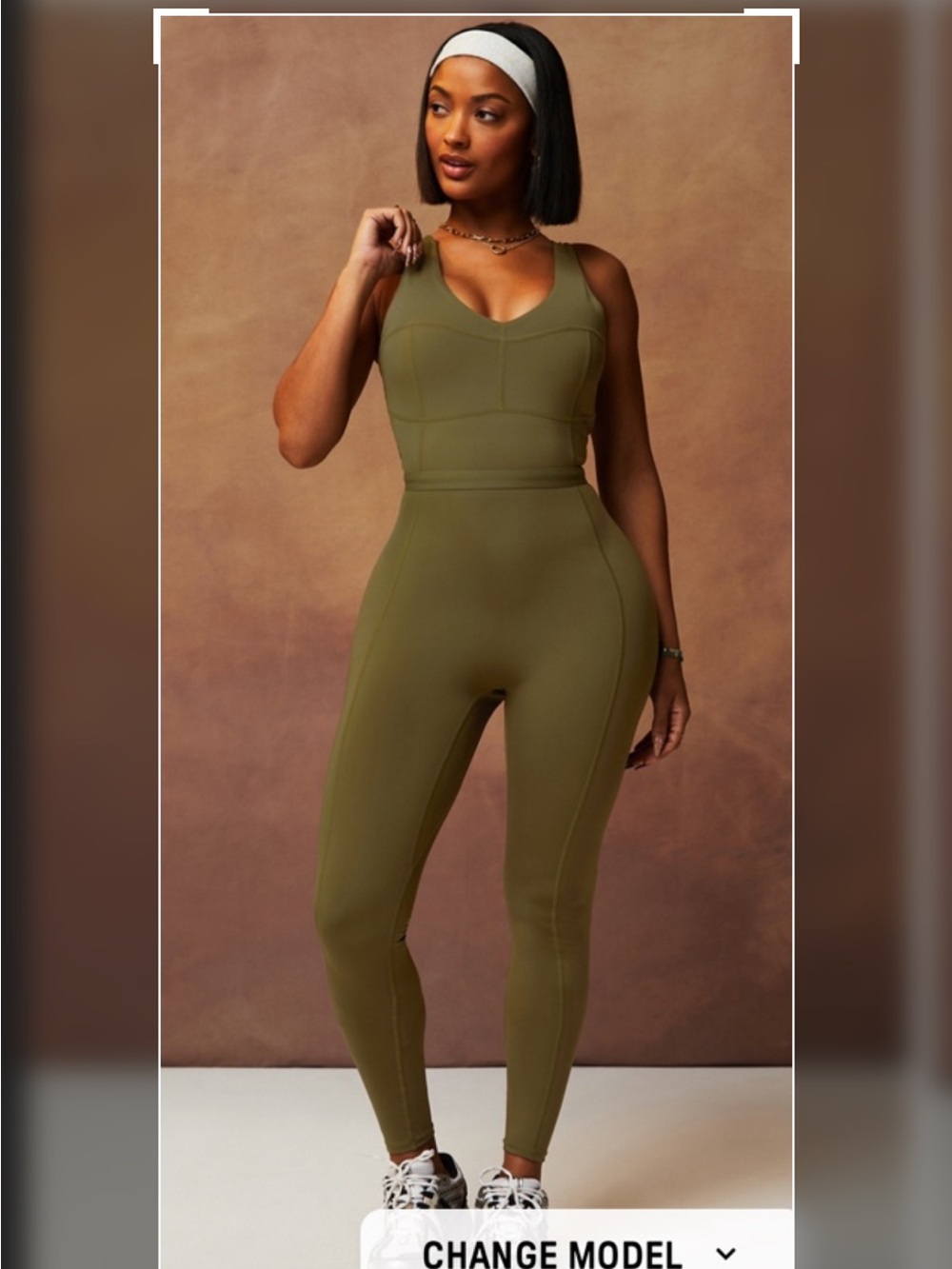 Fabletics Motion 365 onesie in olive green features a racerback design
